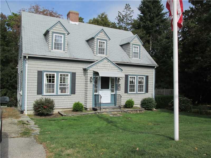 Exterior Front. Classic center hall dormered cape