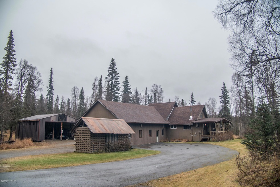 House and Surrounding Buildings