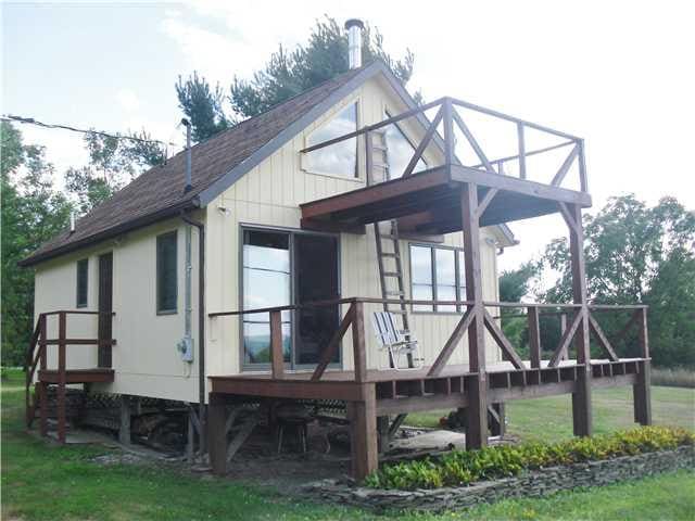 Exterior Front. solid Keuka view cabin with well, 