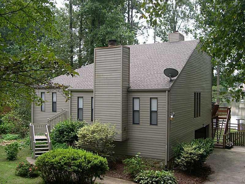 Exterior Front. Note the lake in the back