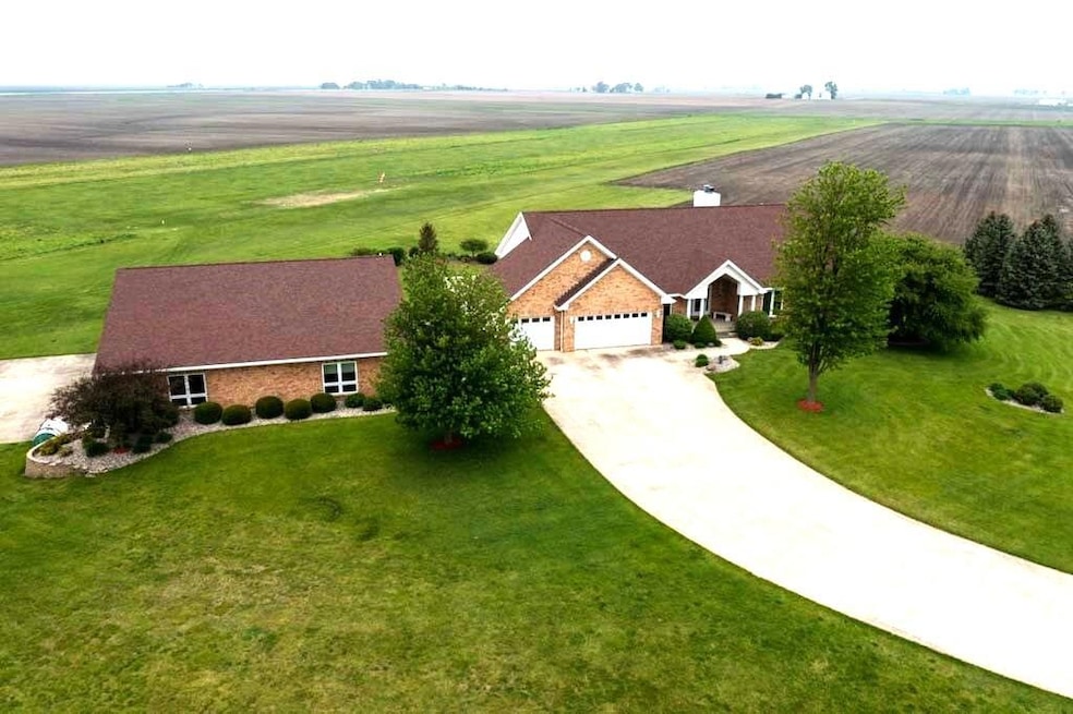 Aerial Front Home and Hanger Even Bright