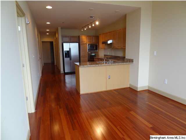 Large open great room kitchen with eat at bar