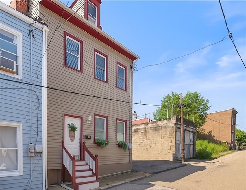 Please note, the side lot to the right of the property is not included.