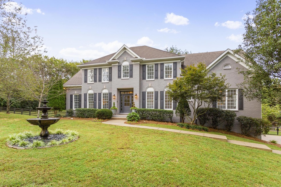 Welcome to 4079 Clovercroft this beautiful brick home sits on 1.8 acres in the heart of Franklin