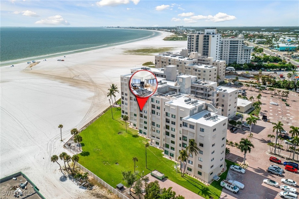 Aerial view with a water view and a view of the be