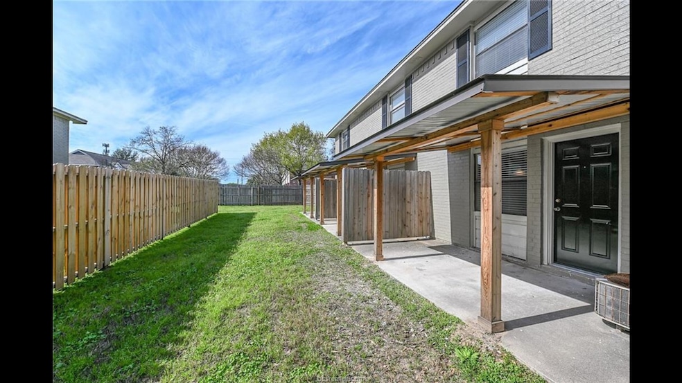 Covered back patio perfect for lounging at your do