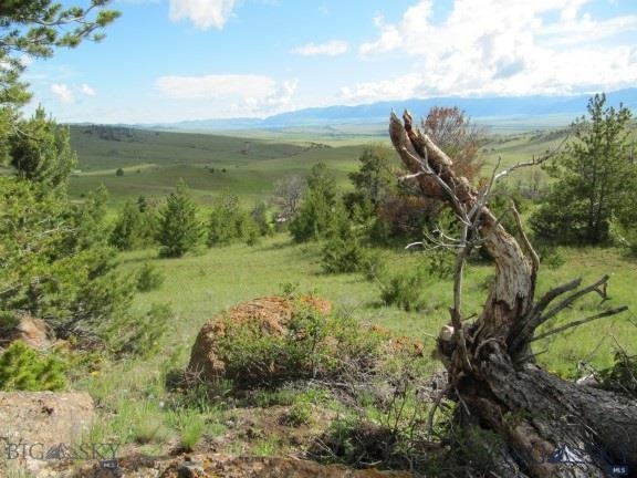 Great views from this elevated, wooded lot with en