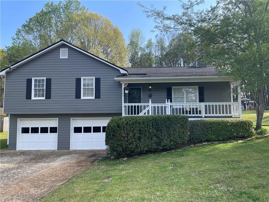 View of front of house with covered porch, a front
