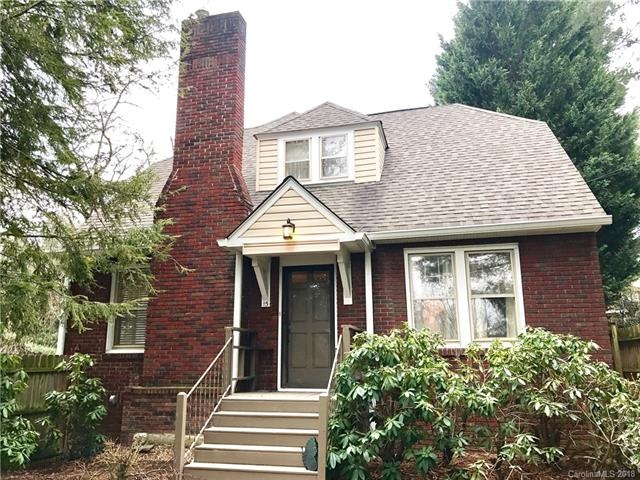 Front of House with Fenced in Low Maintenance Garden