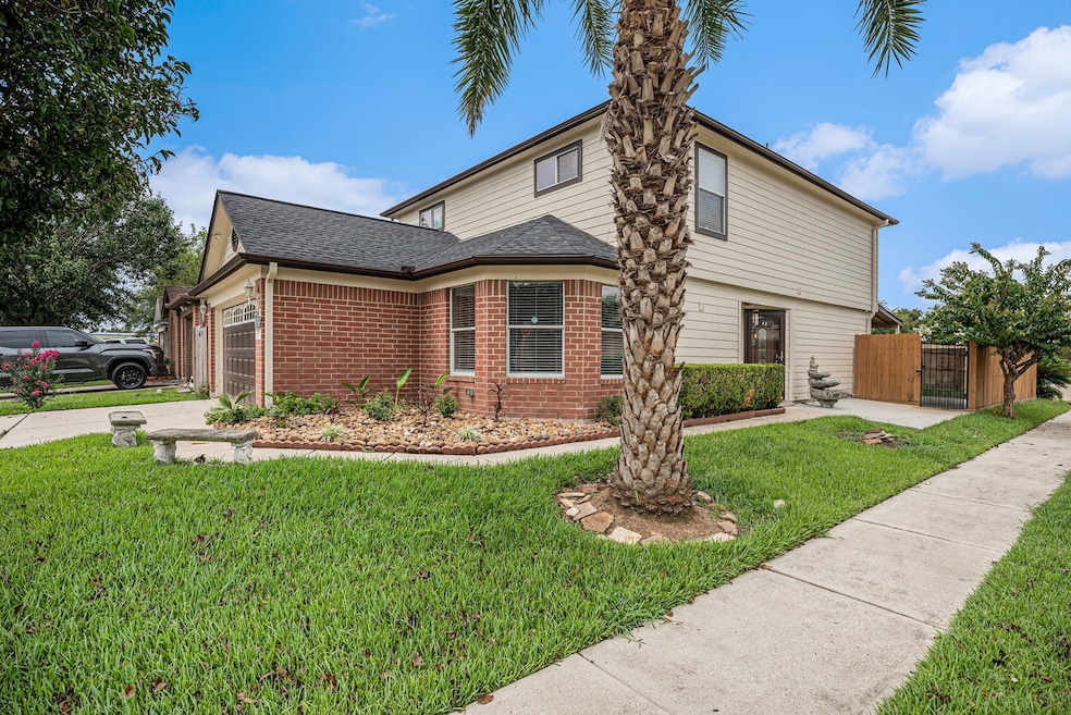 Charming two-story residence nestled in a spacious corner lot.