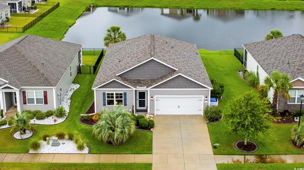 This amazing home backs to a pond! Great location 