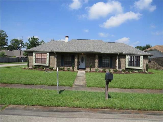 Image. House sits on large corner lot....