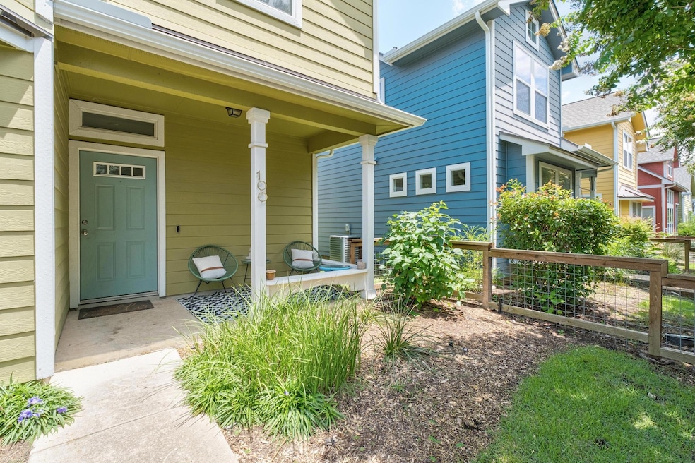 Entrance to property featuring covered porch