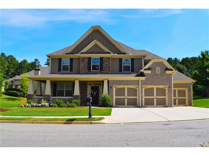 Beautiful stacked stone and brick craftsman home.