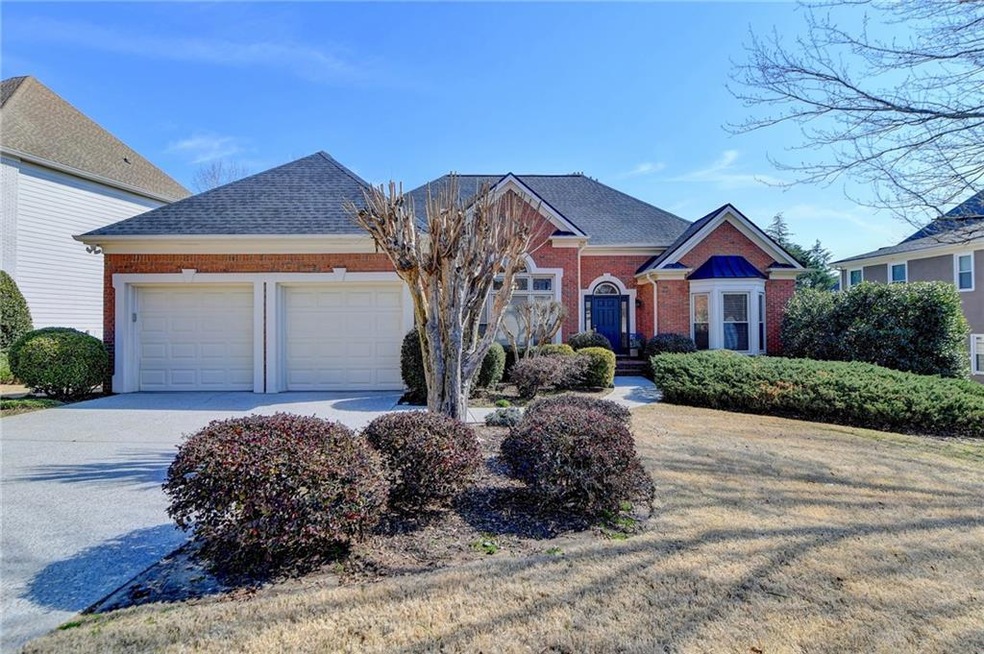 Front of property featuring a garage