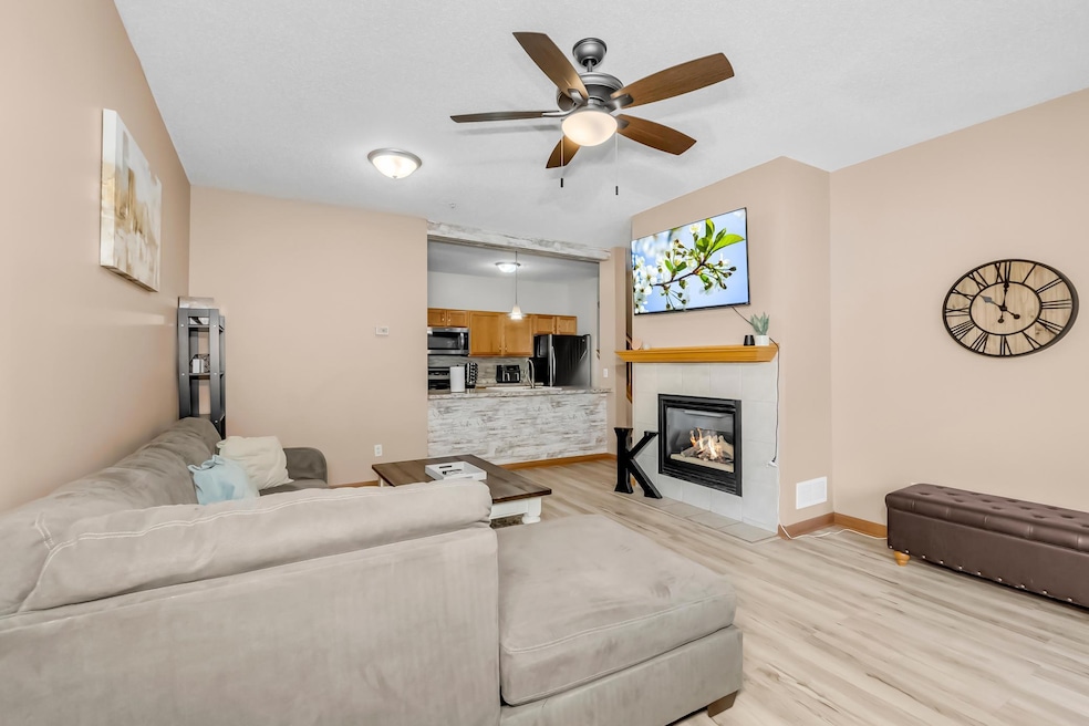 Snuggle up on the couch in front of the gas fireplace