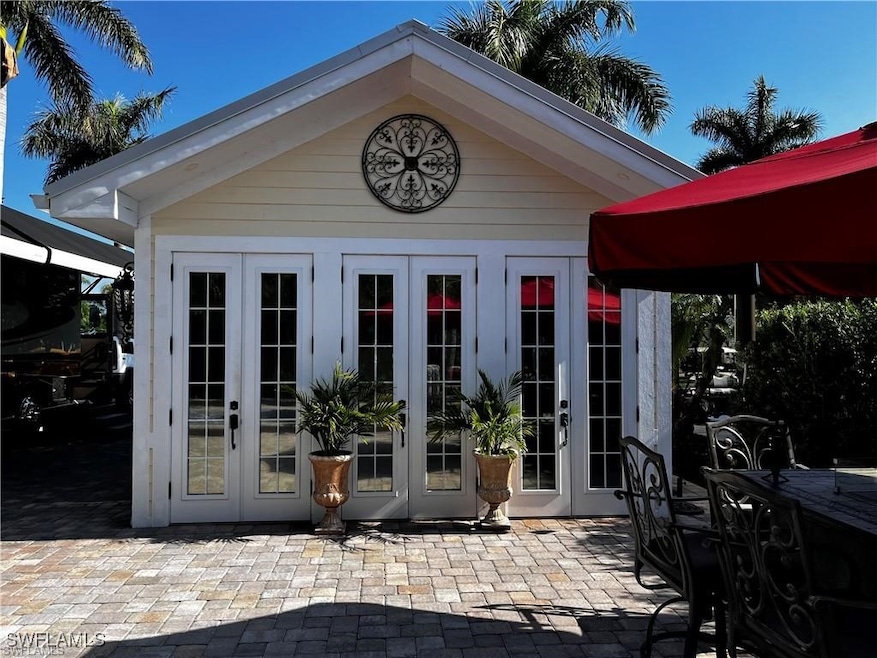View of outdoor structure featuring french doors