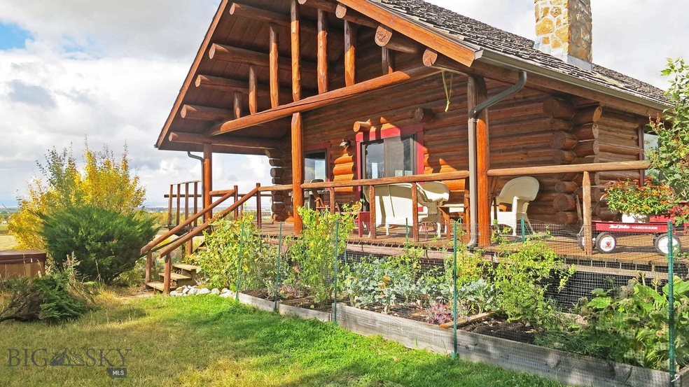 South-facing entrance with wrap around deck on 3 s