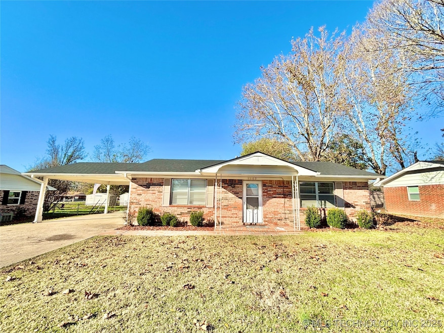 1103 NW 9th St, Stigler, OK 74462 - photo 1