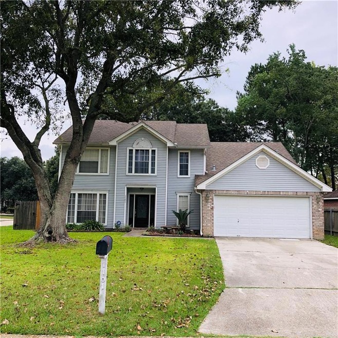 Home is seated on an oversized corner lot