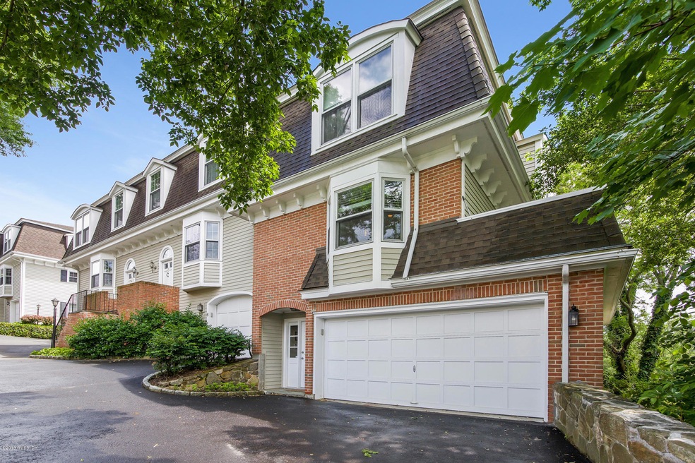 Front View, 2 car garage & deck