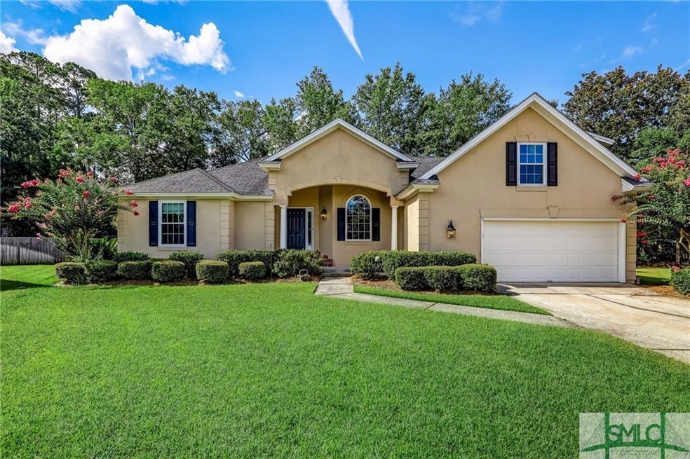 Sited on a large half-acre lot in the small subdiv