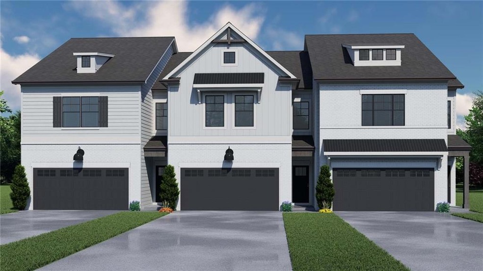 View of front facade featuring a garage