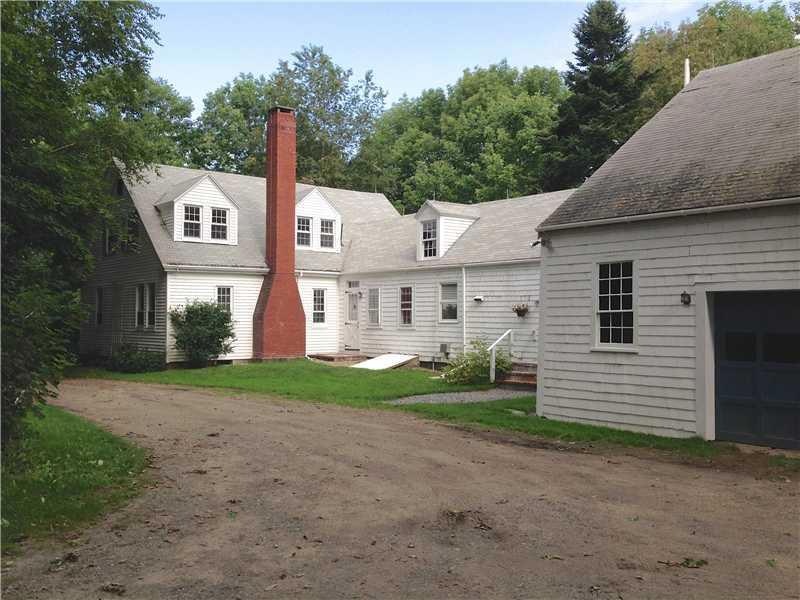 Exterior Front. House and barn