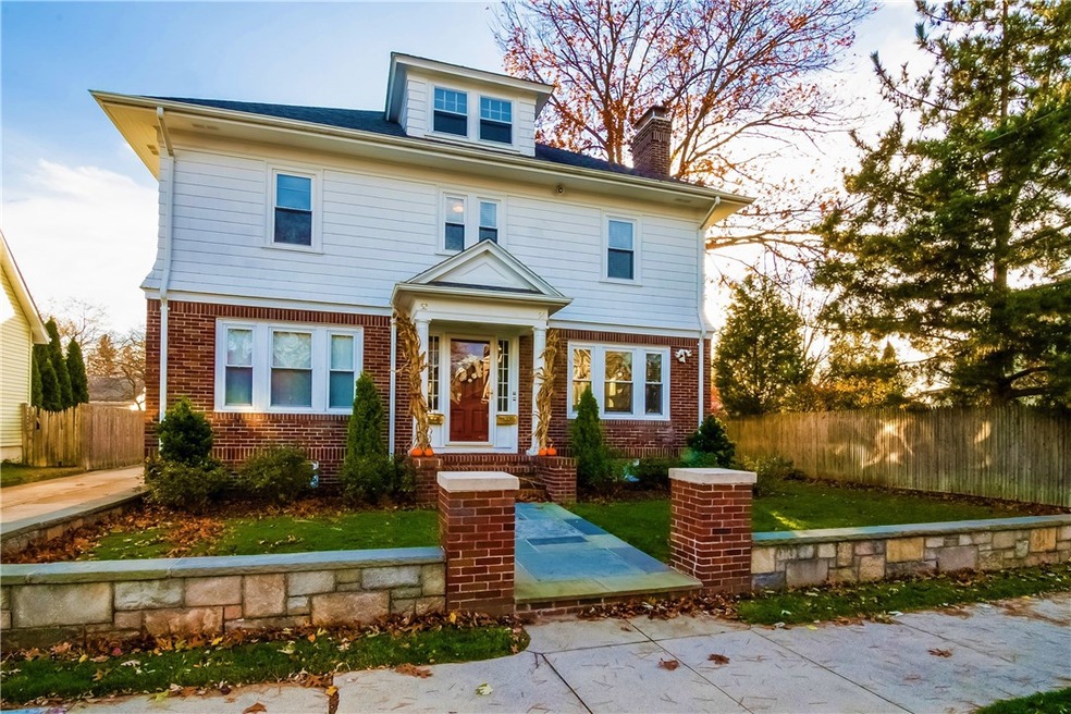 Beautiful front yard with bluestone walkway, sidew