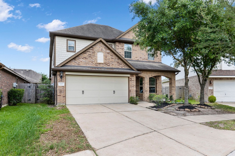 31031 Sundance Woods Ct, Spring, TX 77386 - photo 1