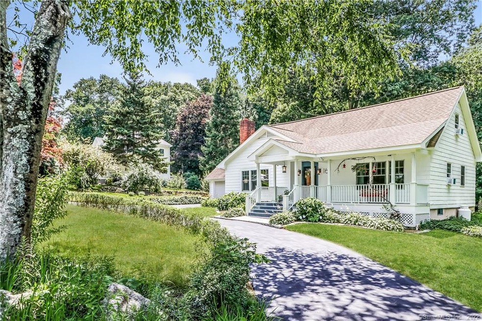 Front view with circular driveway