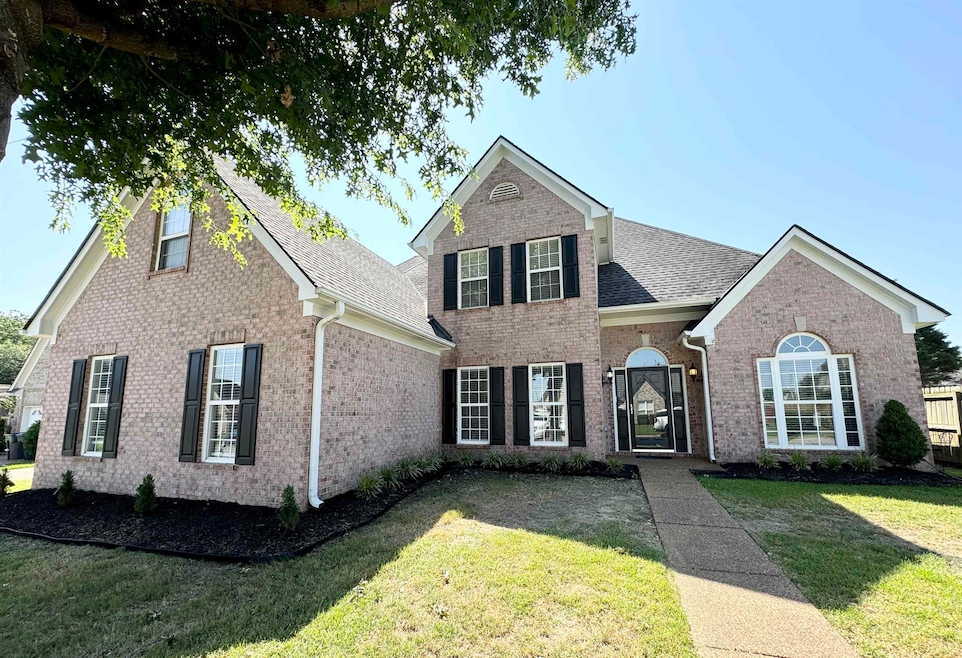 View of front of home featuring a front lawn