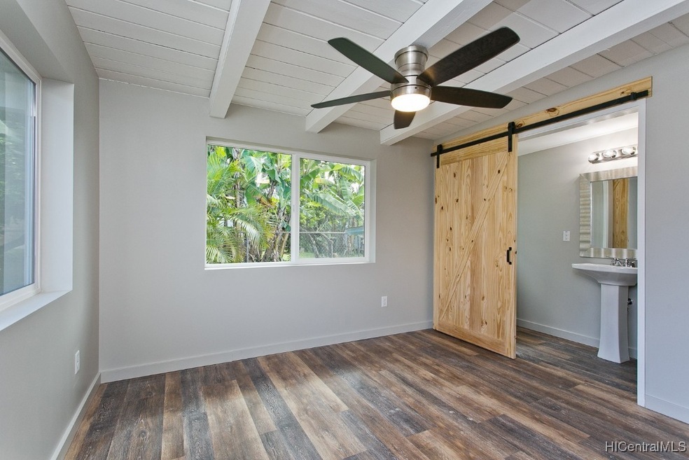 Master bedroom with vaulted ceilings and garden vi