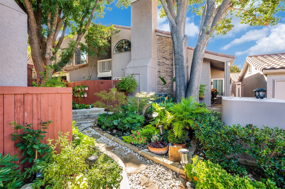 Mediterranean / spanish home with stucco siding and brick siding