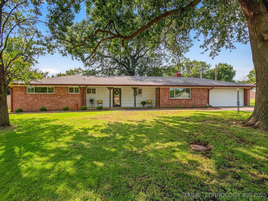 Welcome home! Beautiful red brick exterior and covered front porch.