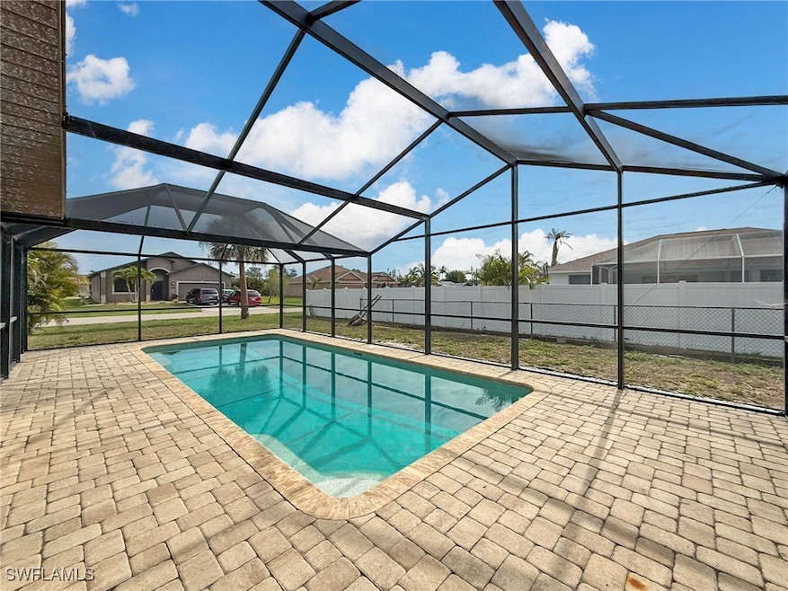 View of swimming pool with a patio area and a lana