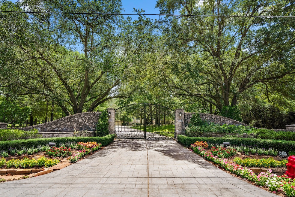 Tucked behind a private entry, a scenic winding dr