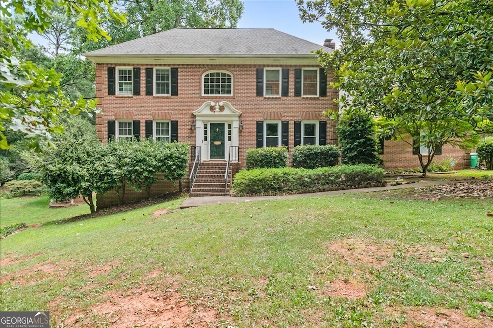 1352 Crooked Tree Ct SW, Lilburn, GA 30047 - photo 1