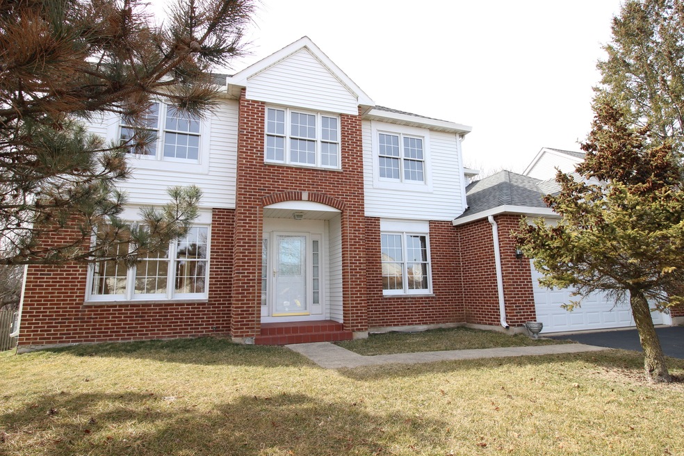 Brick Front Colonial in Cimarron