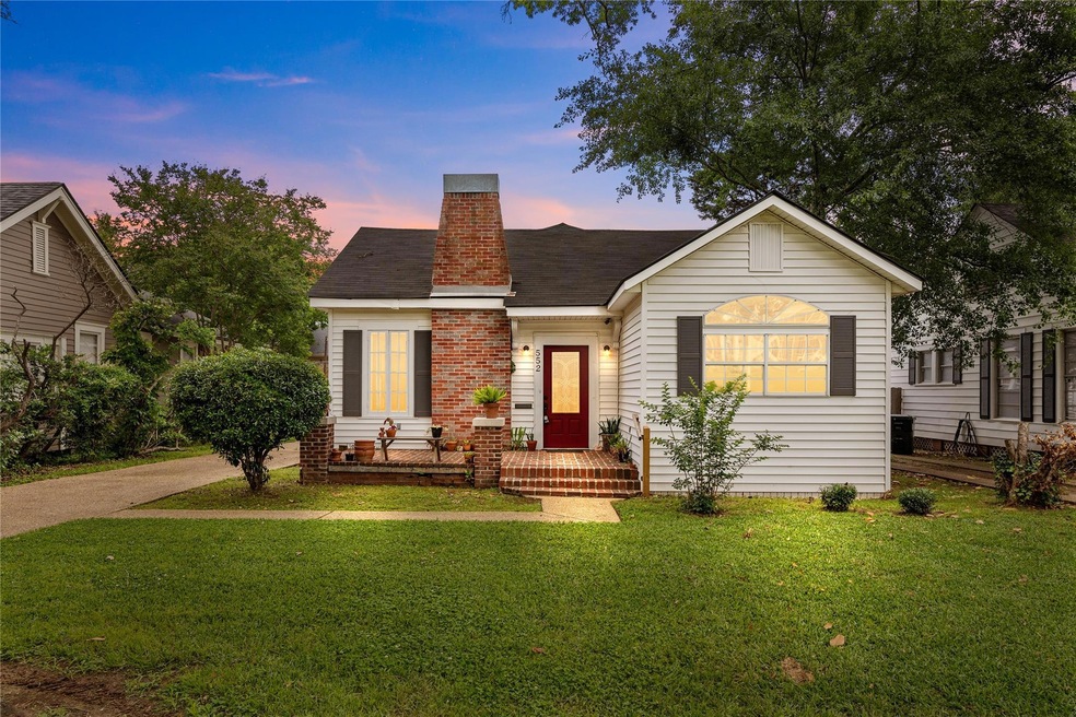 View of front of home with a yard