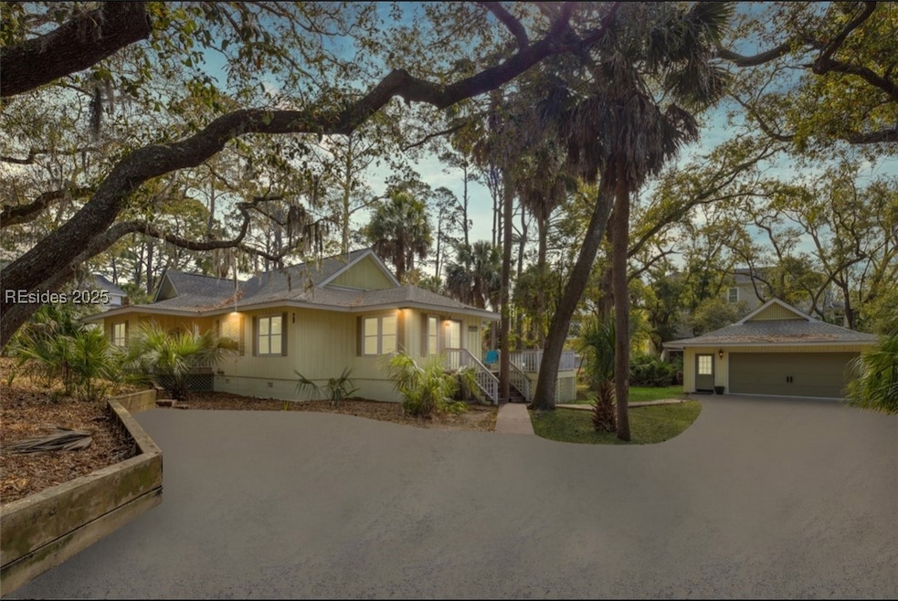 Front view of home with large & spacious driveway