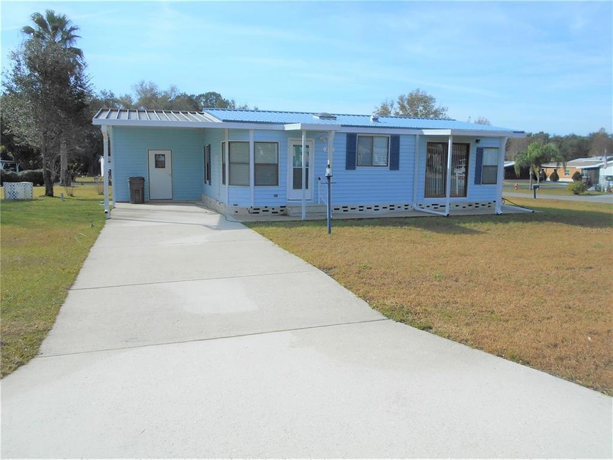 121 Hyde Park Ct, Davenport, FL 33897 - photo 1