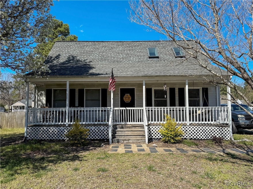 View of front of house featuring a front yard, a p