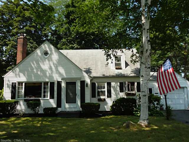 Exterior Front. Pretty tree lined street