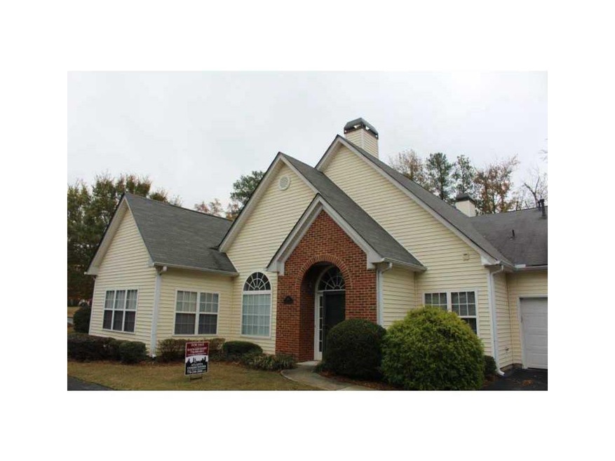 Exterior Front. Corner unit with nice curb appeal.