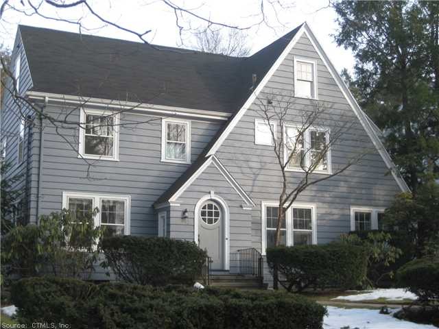Exterior Front. Recently painted clapboards.