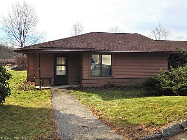 Exterior Front. A sunny, one story unit
