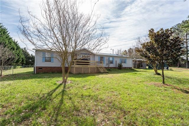 This home is situated on 1 acre and within 1 mile 