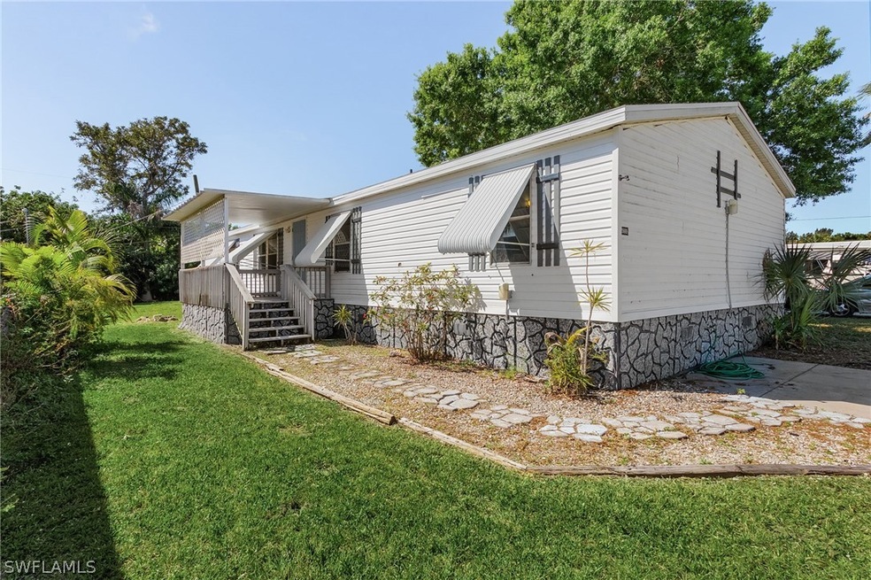 5669 Rainbow Dr, Bokeelia, FL 33922 - photo 1