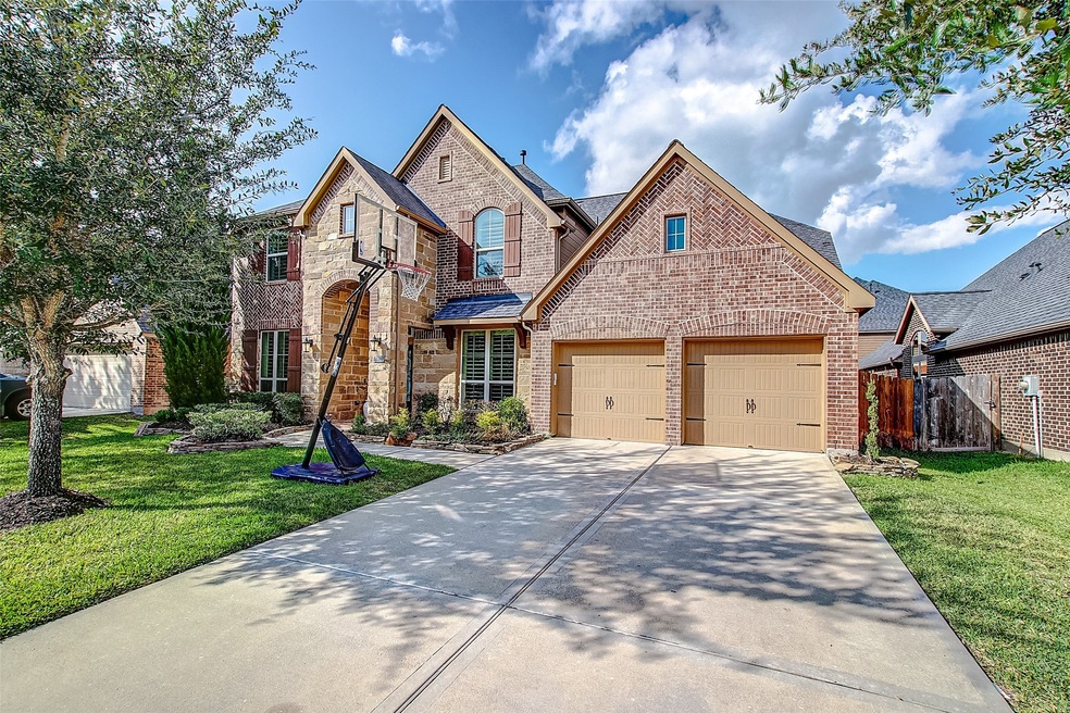 27922 Colonial Point Drive is a gorgeous place to call home. In a highly desired area this home offers plenty of parking including a double-wide driveway with a 3 car garage (tandem). Enjoy all the extra amenities that Firethorne provides for families.